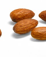 Delicious Smoked almonds from Camel Nuts on a white background