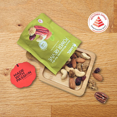 Power Revive Camel Nuts on a wooden tray and health choice badge. Made with Passion. Camel Nuts Singapore