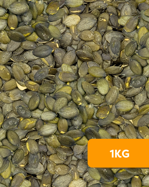 Pile of Camel Nuts organic raw pumpkin seeds with 1KG label