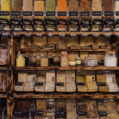 Front view of variety of seeds and nuts displayed at store. Looking for Nuts and seeds for your business? Contact us.