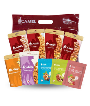 Camel brand mini snack packages including pistachios, cashews, almonds, and mixed snacks on a white background.