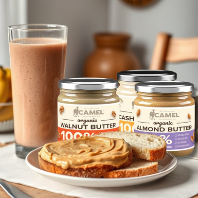 Camel Nuts organic nut butters with a glass of a smoothie and toast in a kitchen setting.