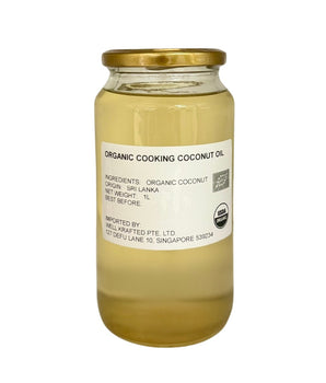 Jar of Camel Nuts' organic cooking coconut oil with a gold lid
