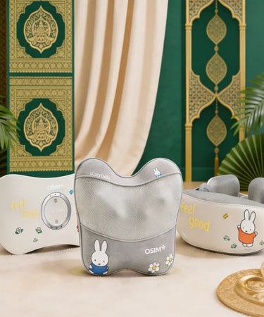 Gray neck pillow with cartoon character design on a beige surface with decorative background